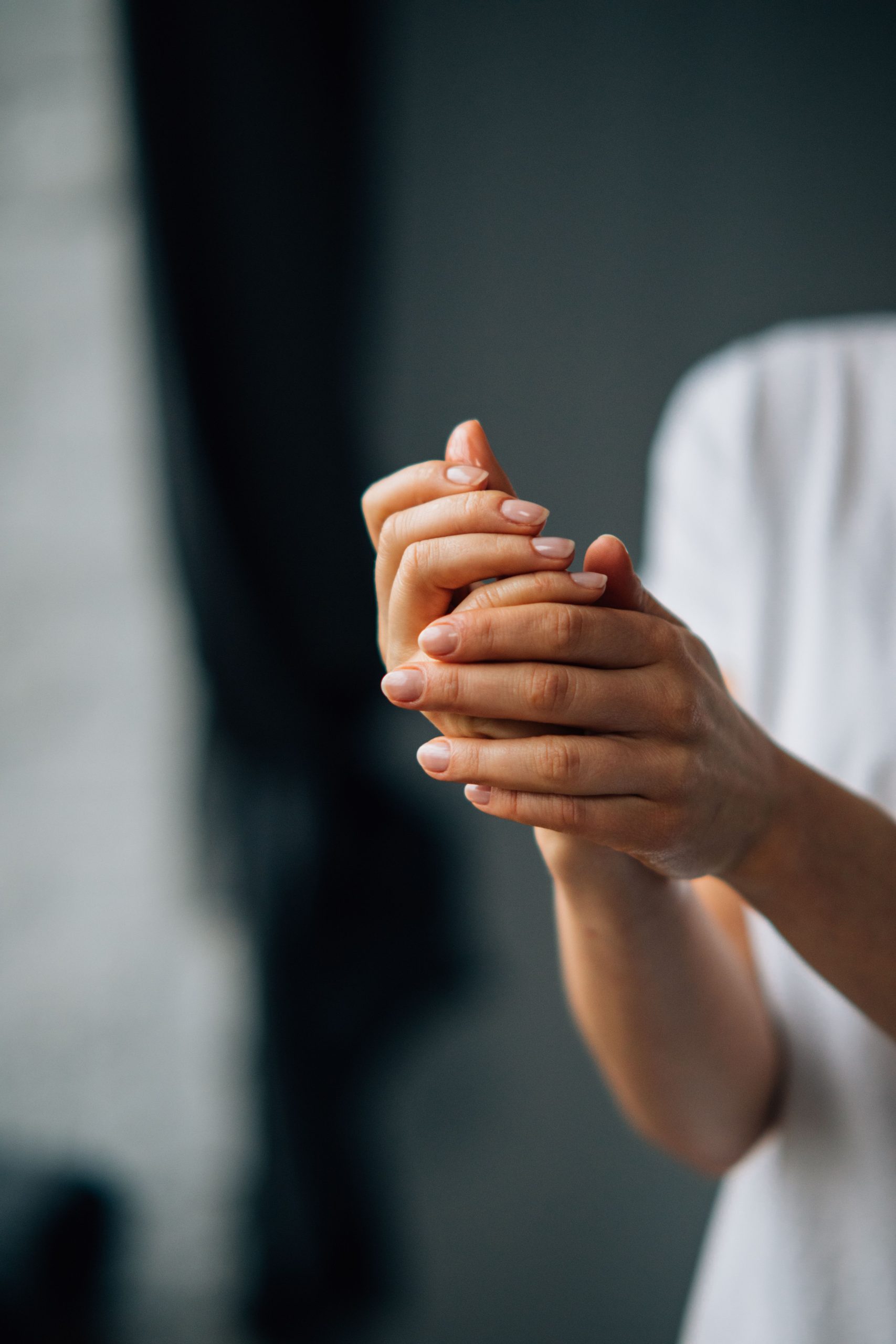 woman rubbing hands together with youthful look